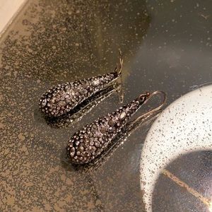 Alexis Bittar crystal drop earrings.